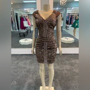 Size 14 & 18 available. Fully sequined. Body con gown (fitted).